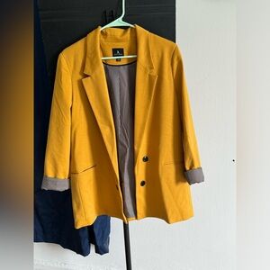 Jules and Leopoldo. 3/4 sleeve mustard, open front blazer.